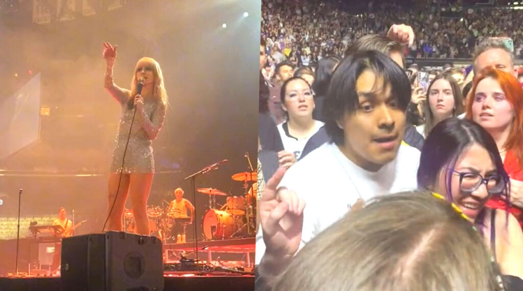 Hayley Williams em ciam de um palco expulsando fãs que estavam causando tumulto na plateia de show da banda Paramore.